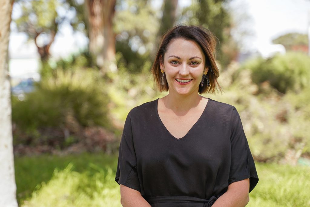 Image of Tammy O'Connor with trees in the background.