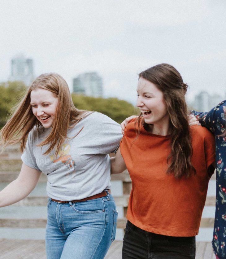 Three friends supporting each other