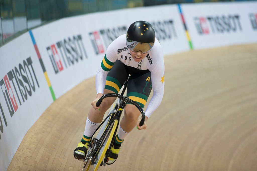 Kaarle McCulloch, world champion track cyclist racing on the track in Australian colours