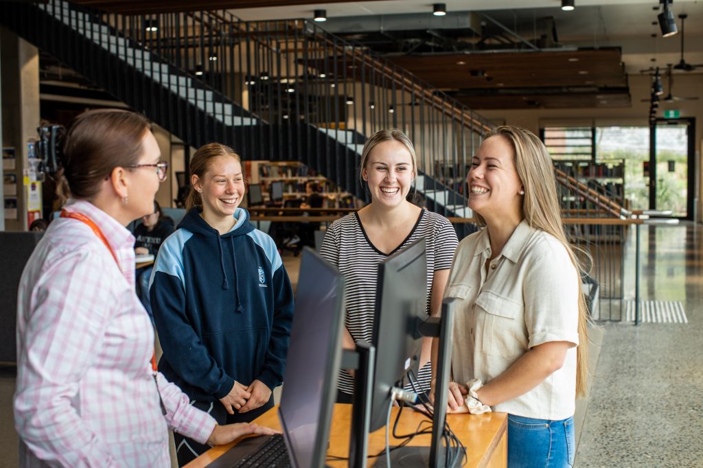 Students studying in Charles Sturt library