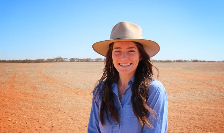 Demi Taylor in a rural setting. Demi is the recipient of an agriculture scholarship from Charles Sturt University