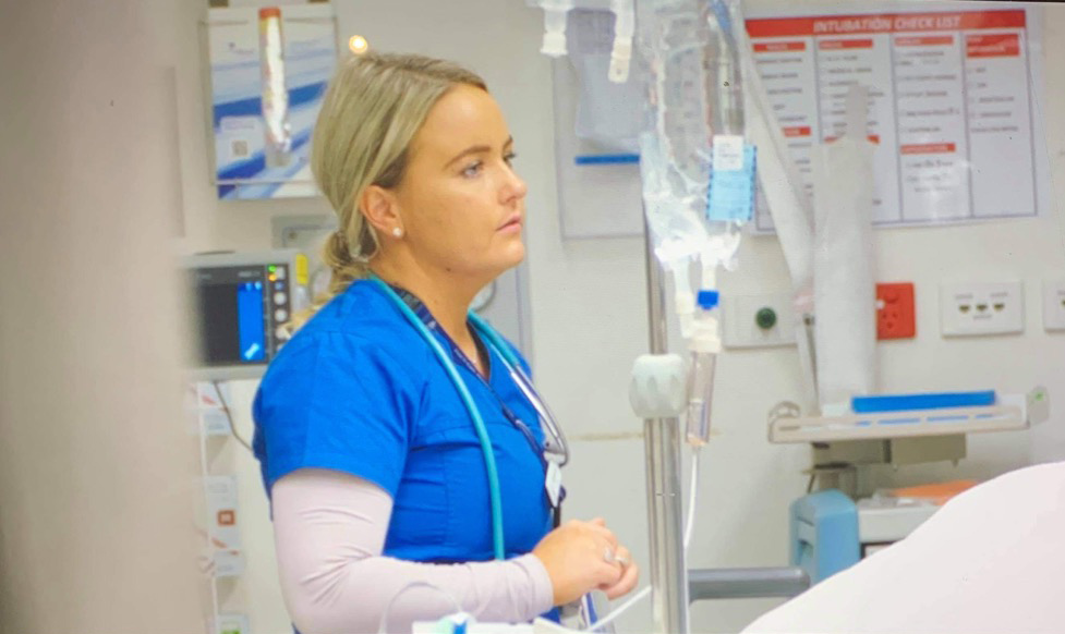 Maddy Bowers demonstrating some of the facets of her nursing career on TV