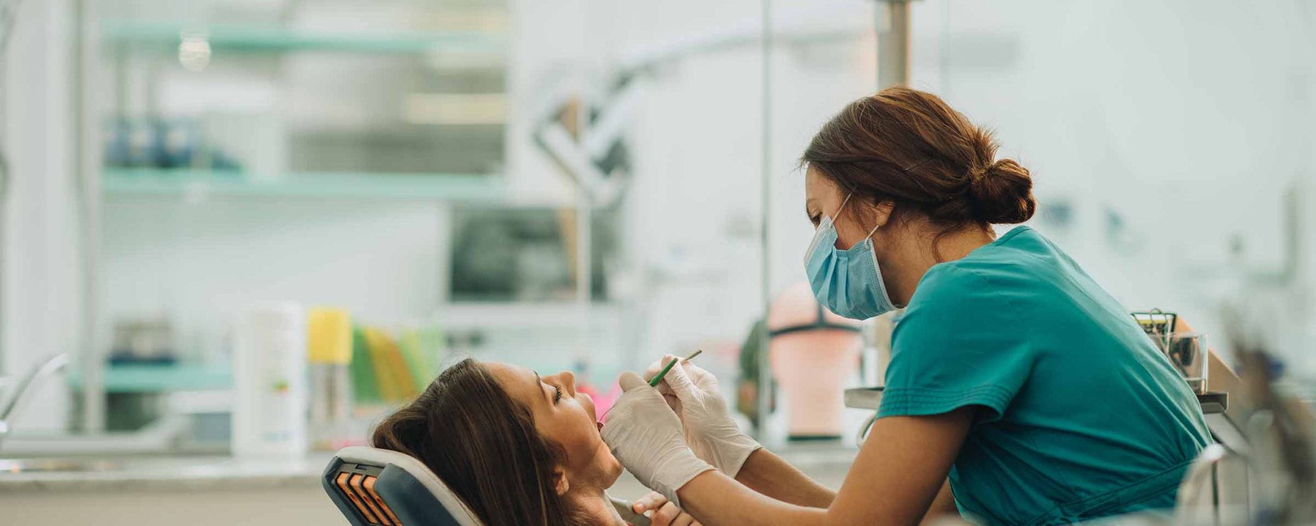 Dentist working on a woman's mouth