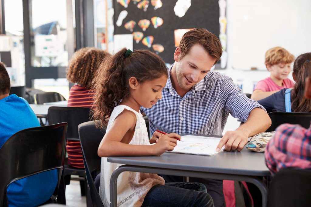 A man working in a school support role