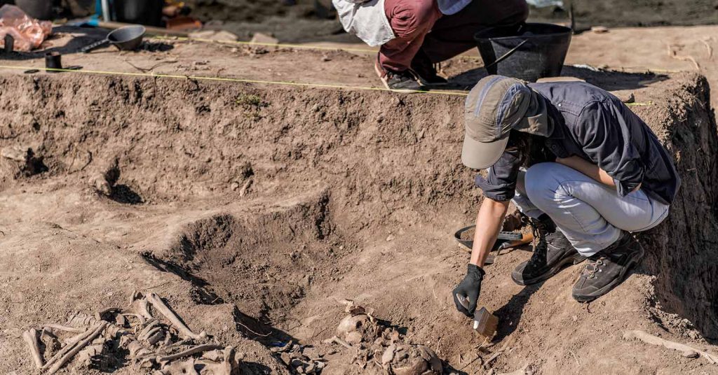 Person on an archaeological dig