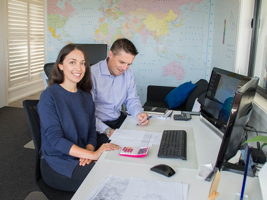 Man and woman at desk