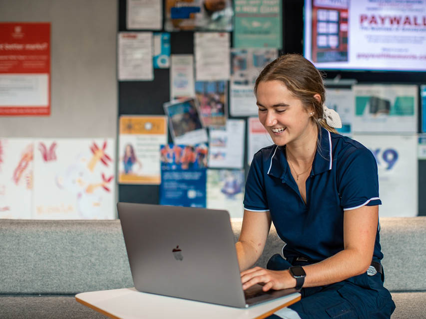 Woman working on laptop