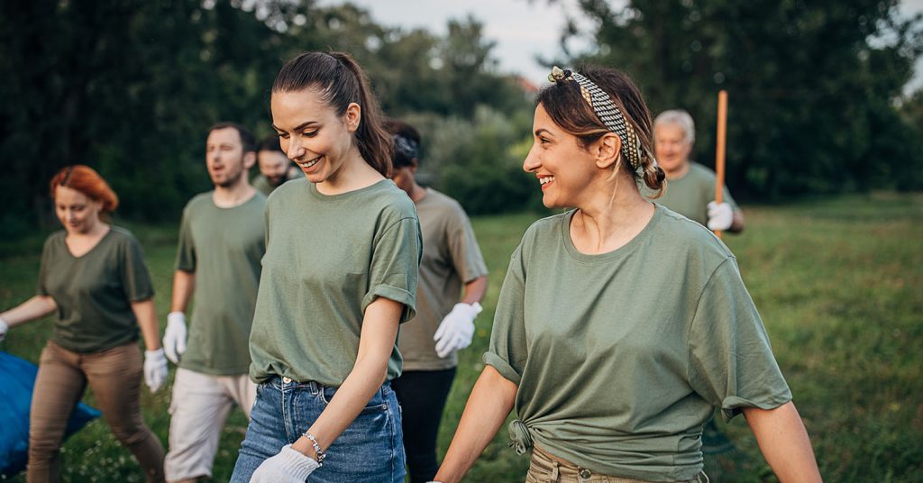 Two women giving back to their community as part of a clean-up rubbish group