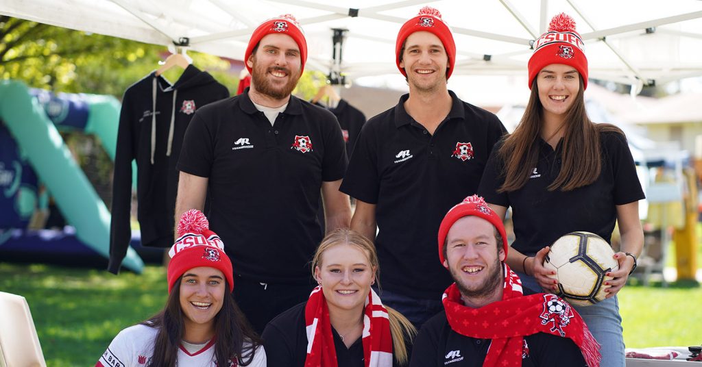 University sports team members. Socialising is one of the top mental health tips for university students