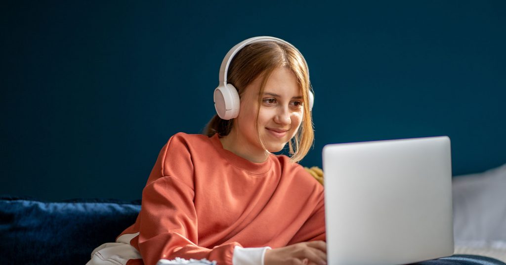 Female student studying online.