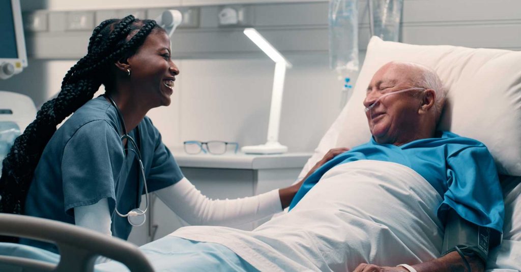 Healthcare worker with patient.