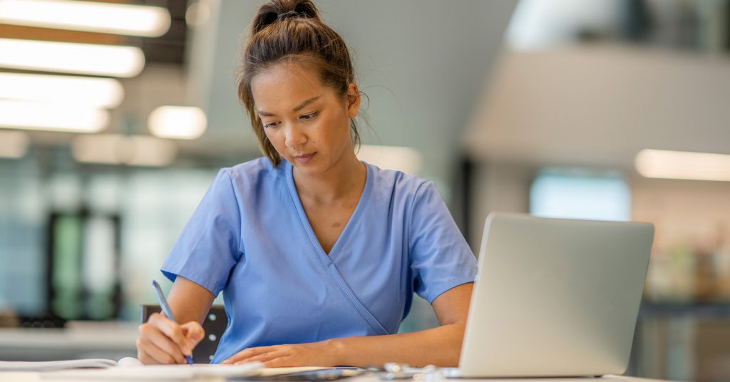 nurse with laptop