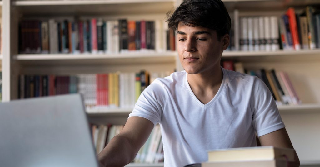 Student studying on laptop