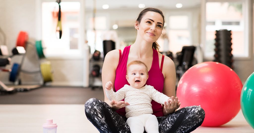 mother and baby at gym