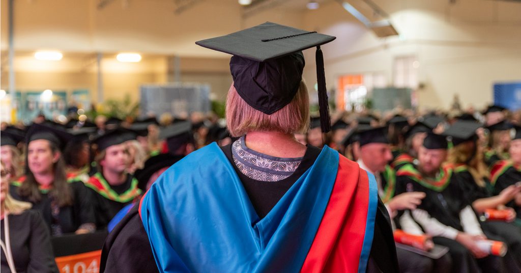 A person graduating at Charles Sturt