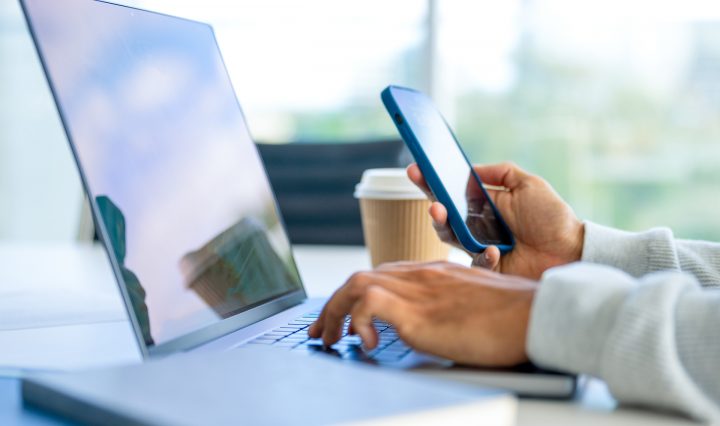 Person typing on laptop