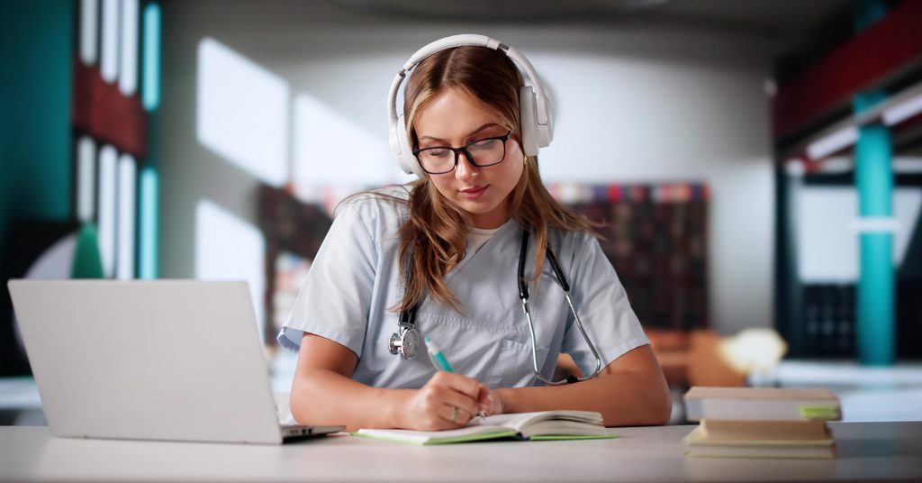 person studying at desk